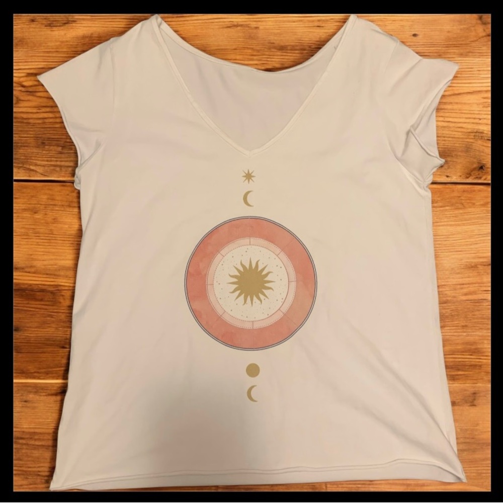 Elegant Cream Graphic Tee with Celestial Design